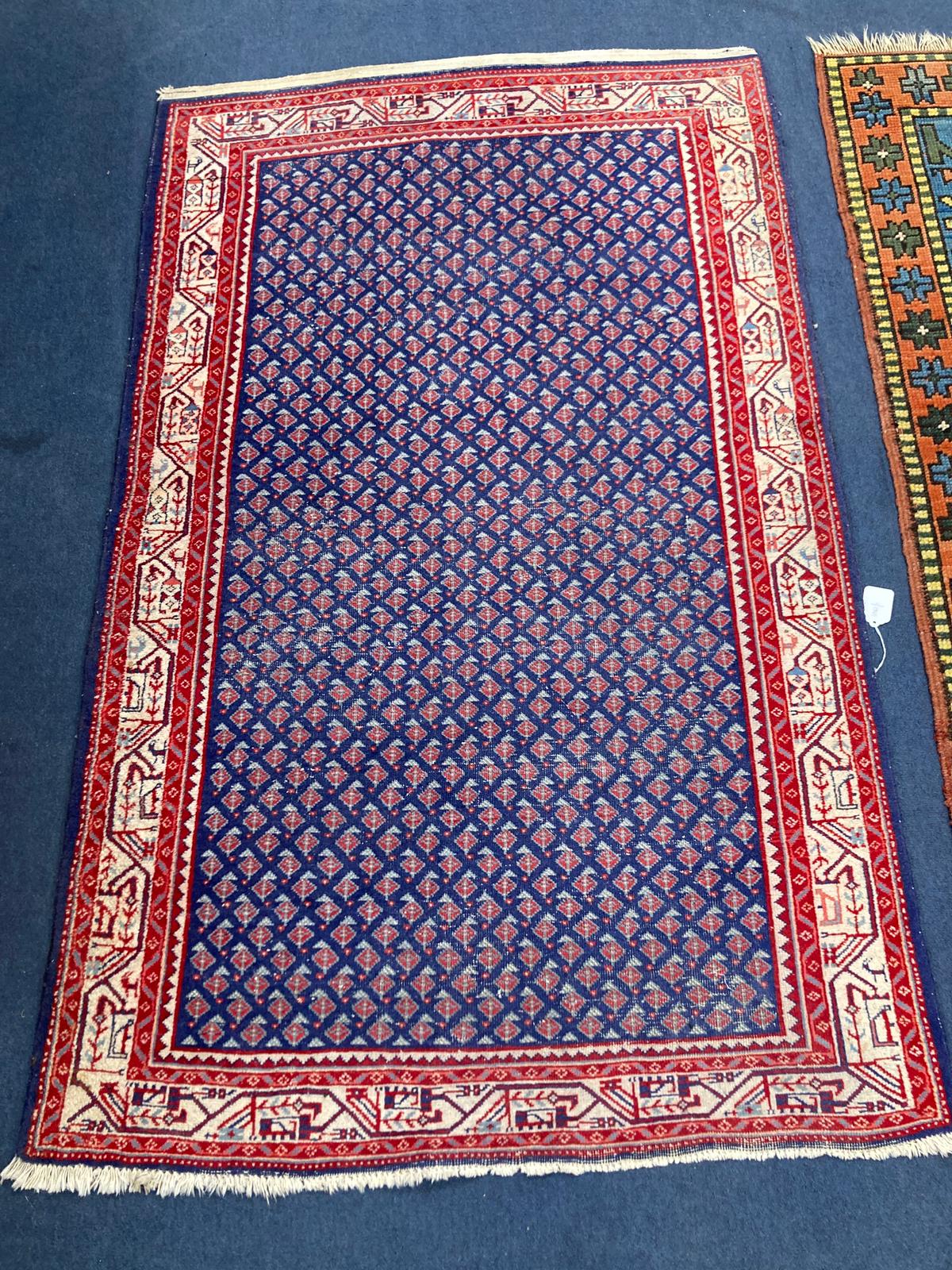 A North West Persian blue ground rug, 160 x 100cm